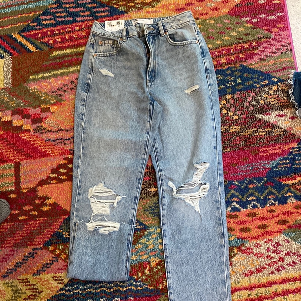 Garage Denim Medium Wash Mom/ high rise jeans Size 24 never worn with tags.